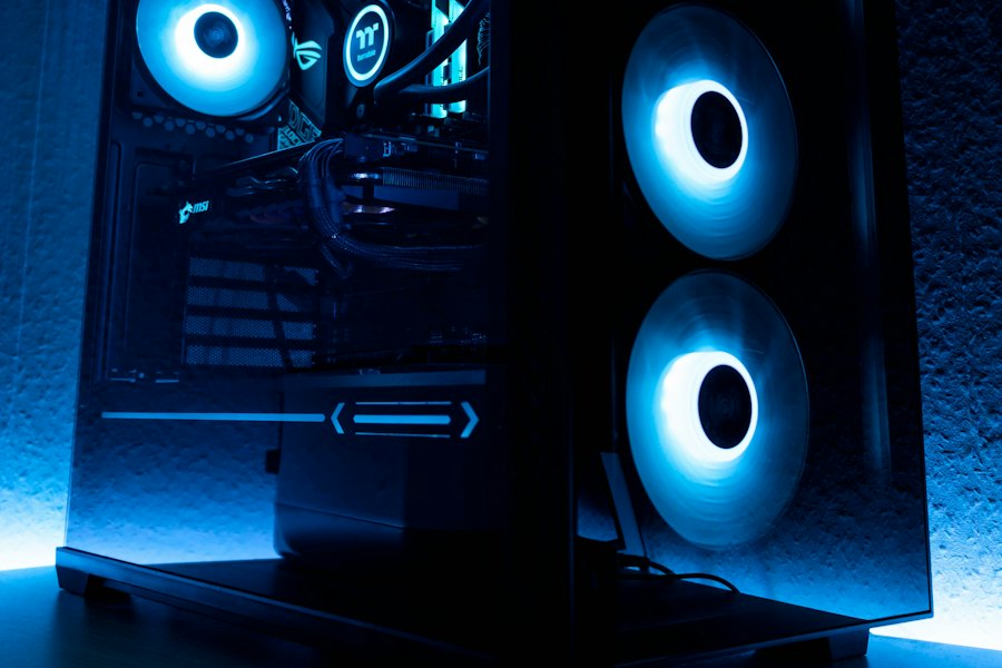 A custom-built desktop PC with lit fans (stock photo)